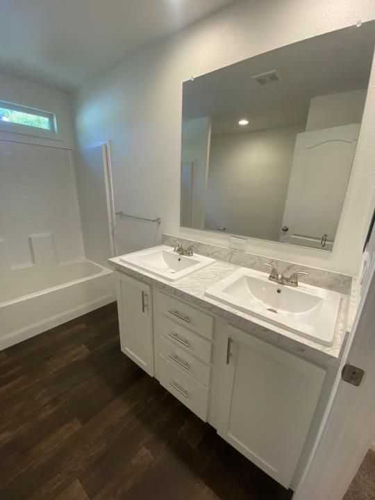 Bathroom, Dual Sink Vanities, Interior, Recessed Lighting, Wood Texture Flooring