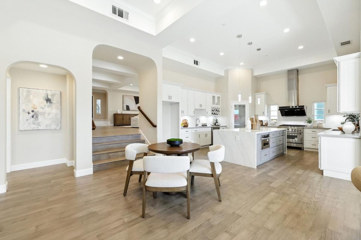 Dining room, Interior, Kitchen, Pendant Lights, Recessed Lighting, Stainless Steel Appliances, Wood Texture Flooring