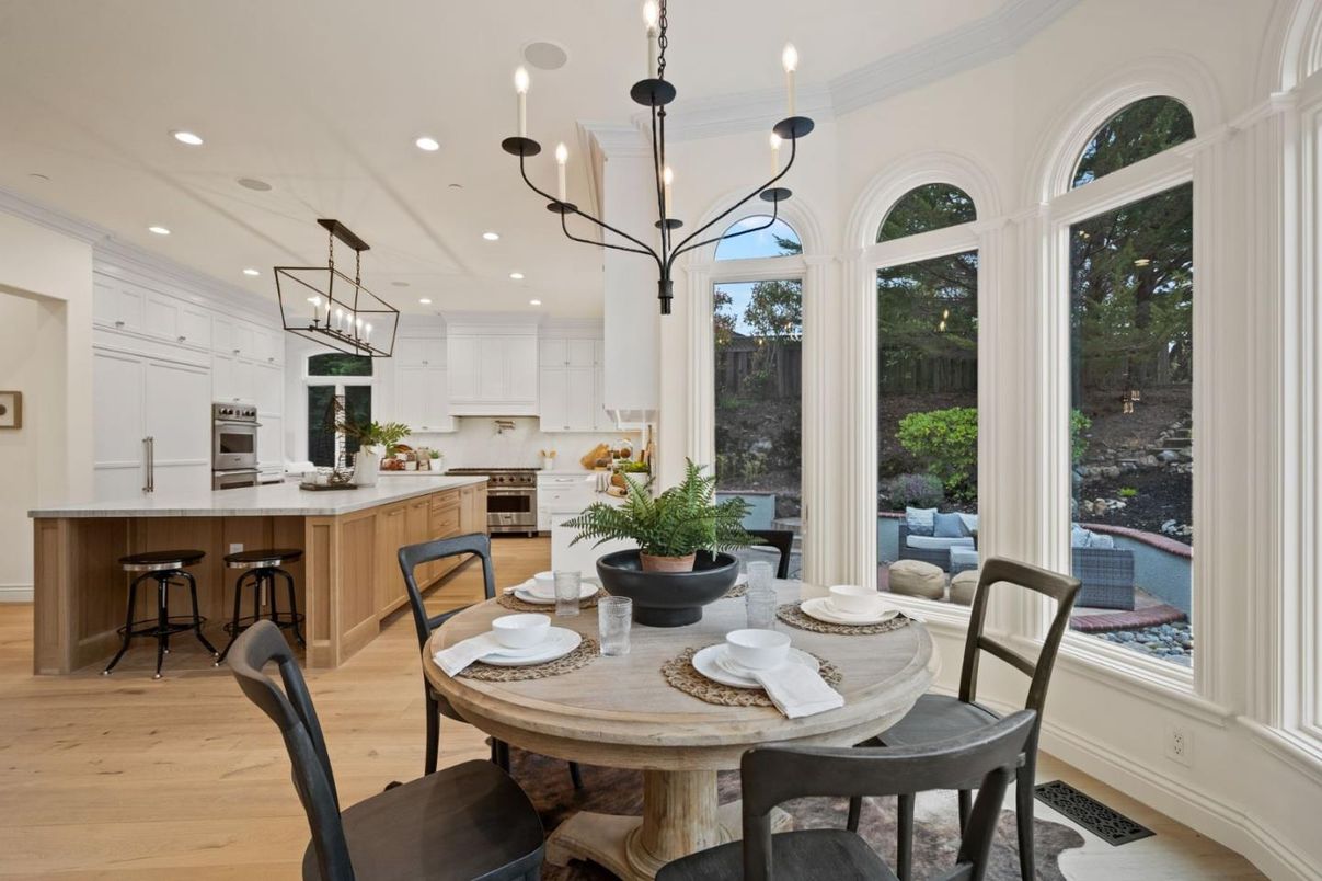 Chandelier, Dining room, Interior, Kitchen, Pendant Lights, Recessed Lighting, Stainless Steel Appliances, Wood Texture Flooring
