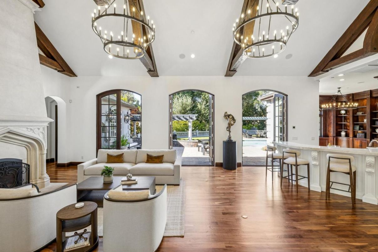 Chandelier, Dining room, Fireplace, Interior, Living room, Pendant Lights, Recessed Lighting, Wooden Beams, Wood Texture Flooring