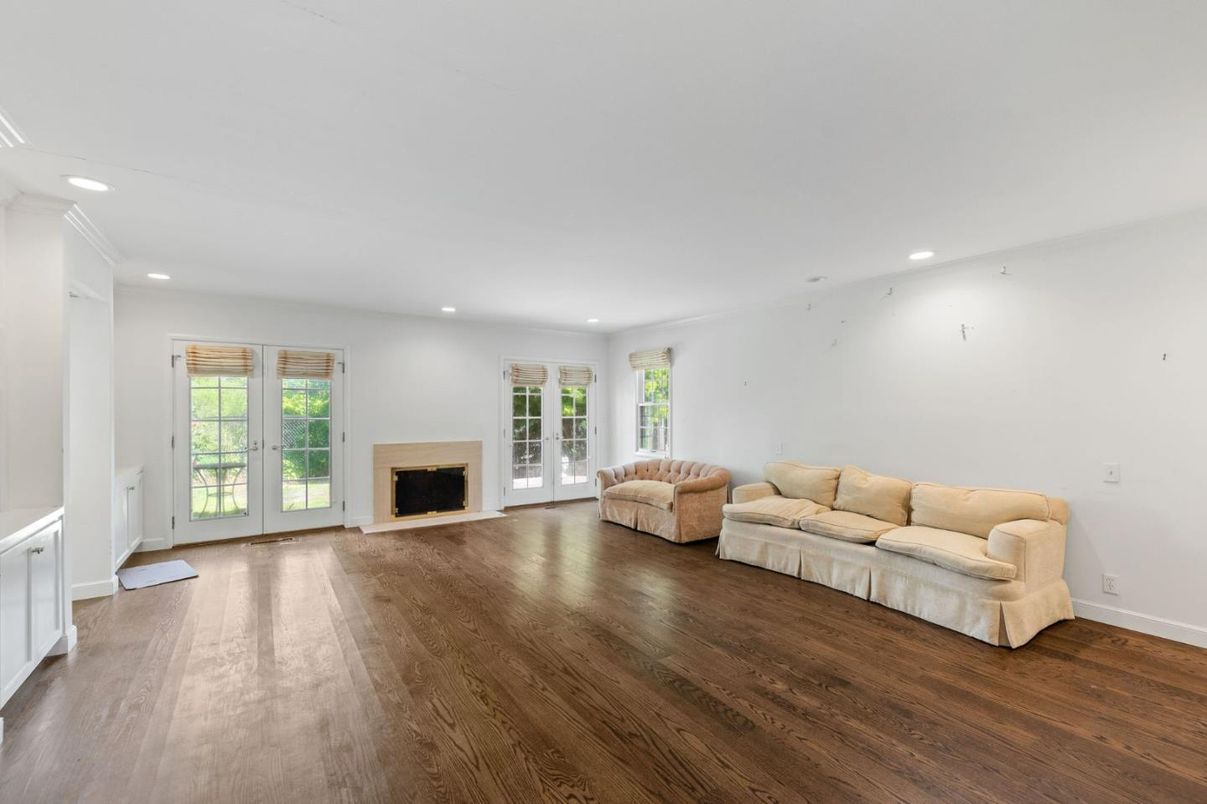 Empty room, Fireplace, Interior, Living room, Recessed Lighting, Wood Texture Flooring