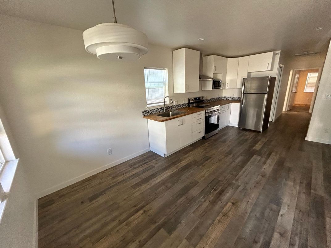 Interior, Kitchen, Pendant Lights, Stainless Steel Appliances, Wood Texture Flooring