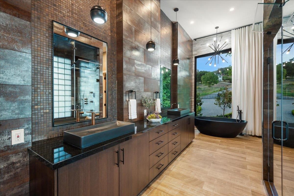 Bathroom, Dual Sink Vanities, Free Standing Baths, Glass Shower, Interior, Pendant Lights, Recessed Lighting, Wood Texture Flooring
