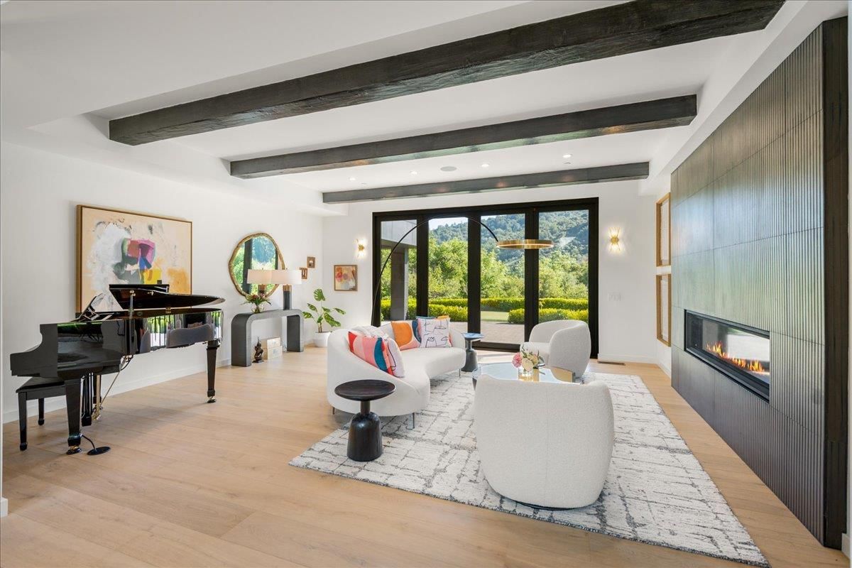 Fireplace, Interior, Living room, Piano, Recessed Lighting, Wooden Beams, Wood Texture Flooring