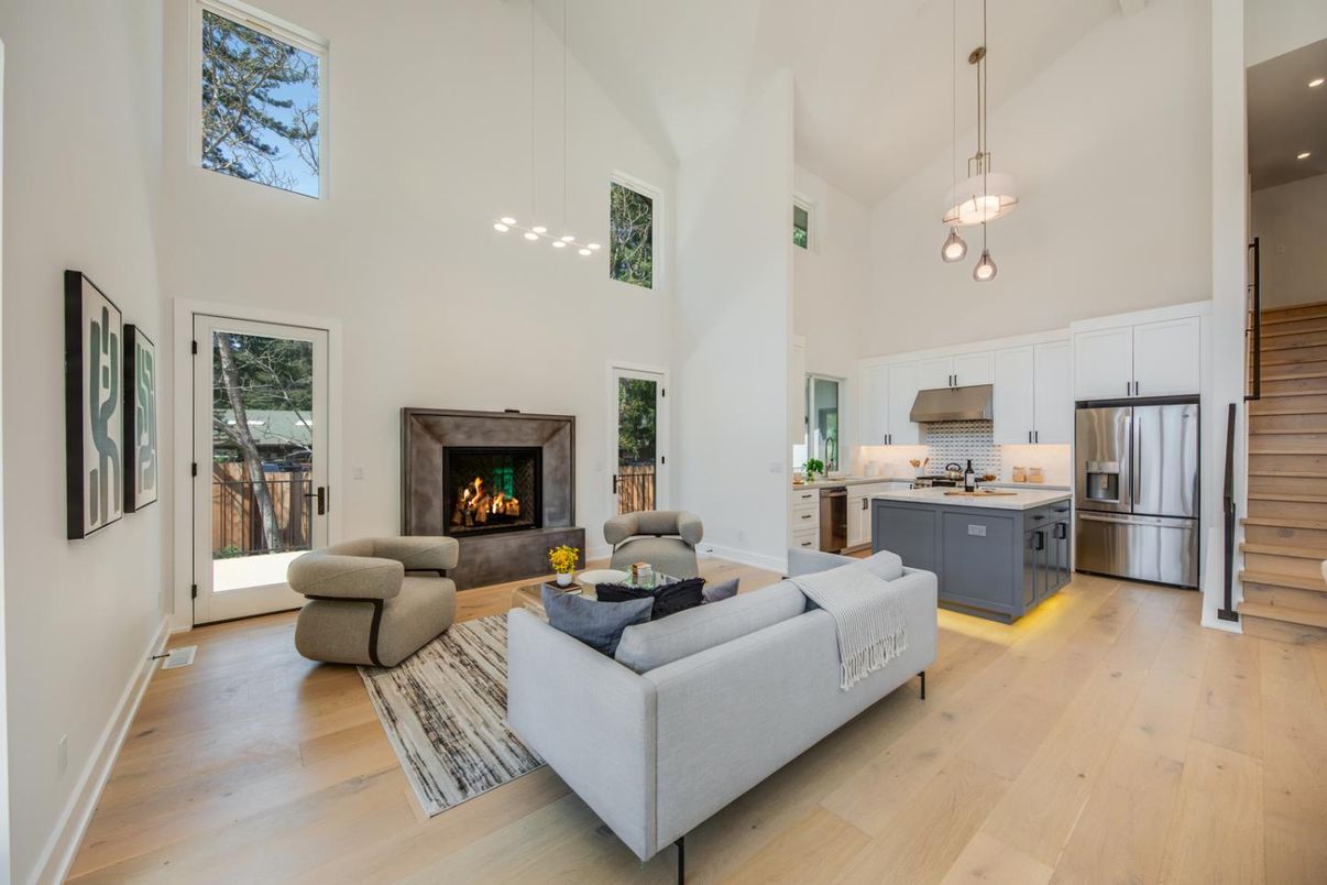 Fireplace, Interior, Kitchen, Living room, Pendant Lights, Recessed Lighting, Stainless Steel Appliances, Wood Texture Flooring