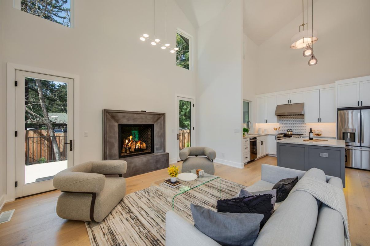 Fireplace, Interior, Kitchen, Living room, Pendant Lights, Stainless Steel Appliances, Wood Texture Flooring