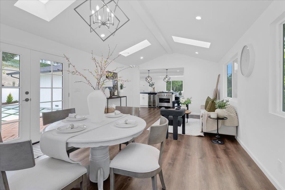 Dining room, Interior, Pendant Lights, Recessed Lighting, Stainless Steel Appliances, Wood Texture Flooring