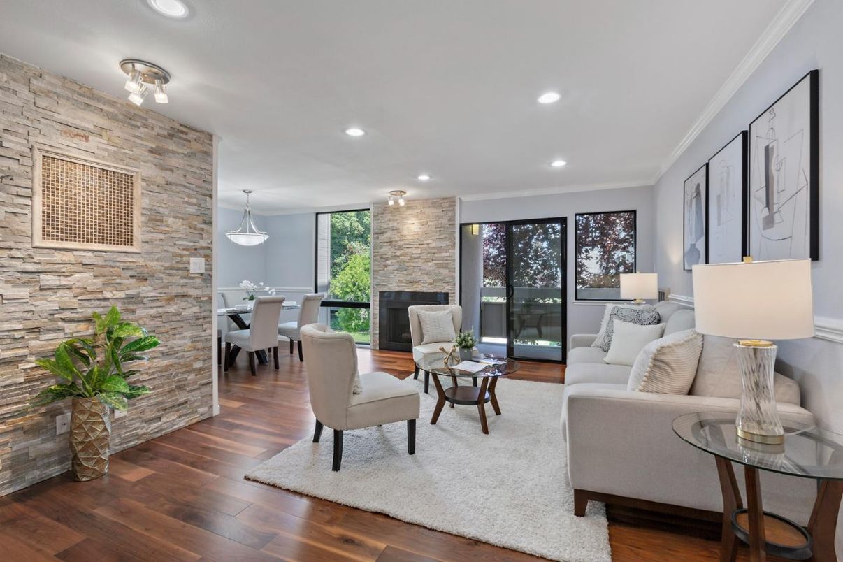 Dining room, Fireplace, Interior, Living room, Pendant Lights, Recessed Lighting, Stone Walls, Wood Texture Flooring