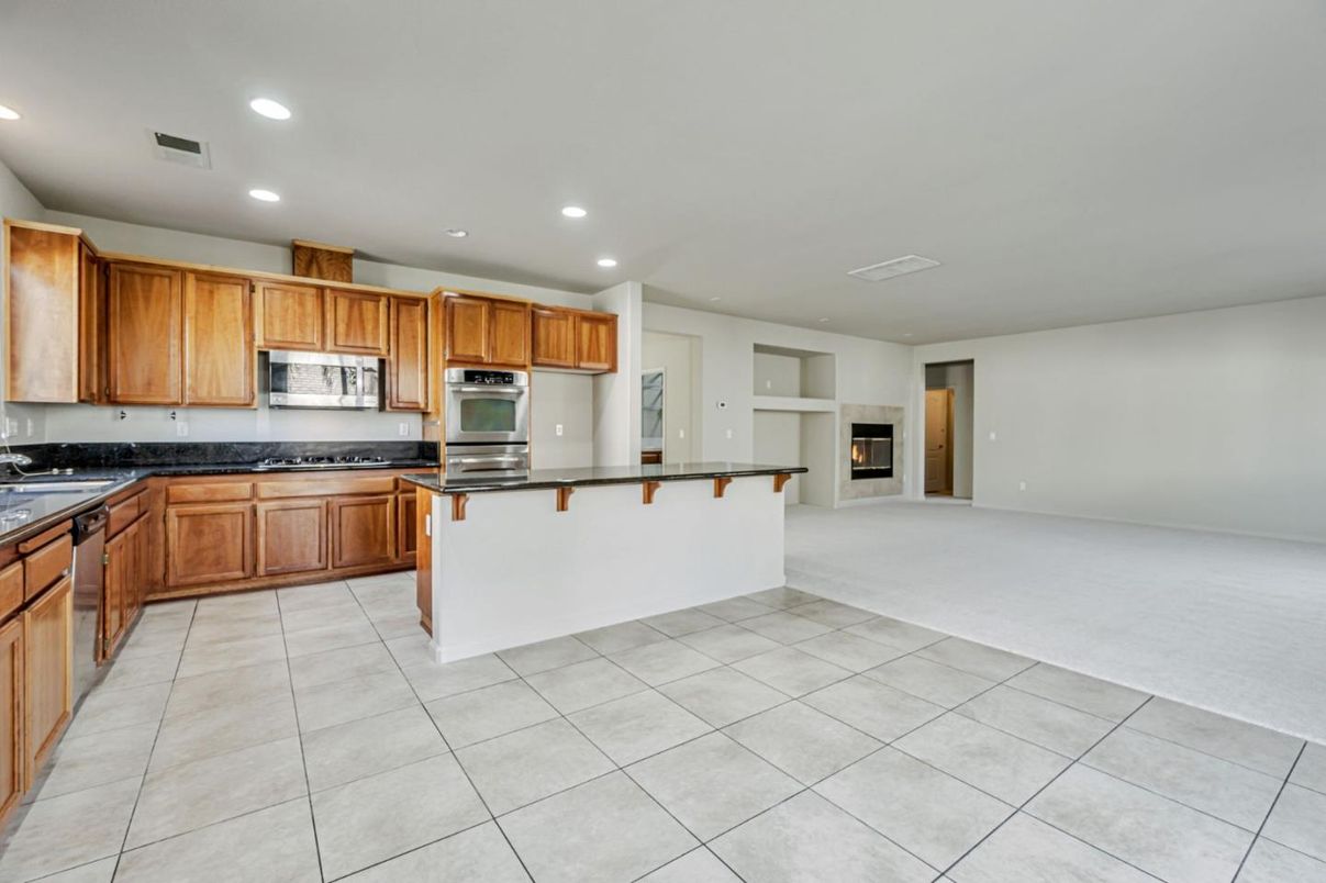 Fireplace, Interior, Kitchen, Recessed Lighting, Stainless Steel Appliances
