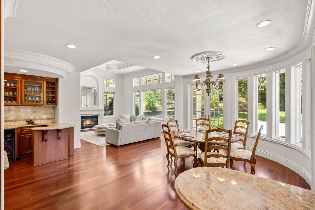 Chandelier, Dining room, Fireplace, Interior, Living room, Recessed Lighting, Wood Texture Flooring