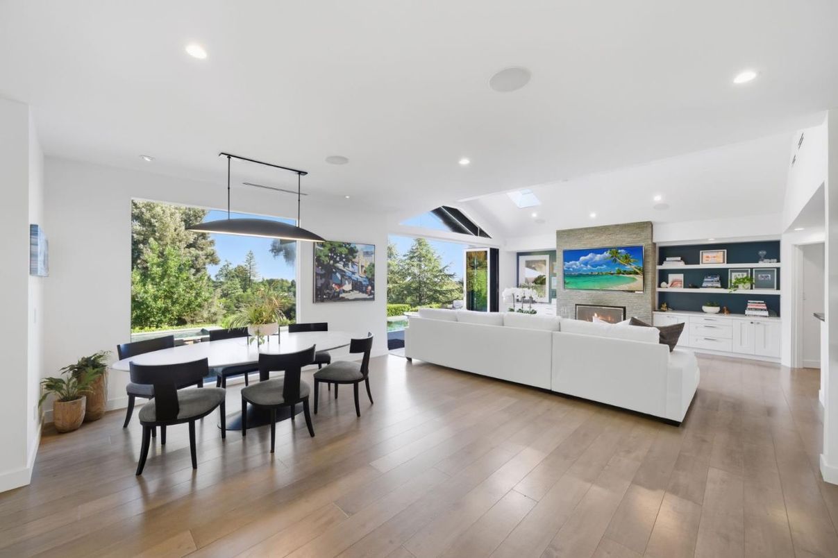 Dining room, Fireplace, Interior, Living room, Pendant Lights, Recessed Lighting, Wood Texture Flooring