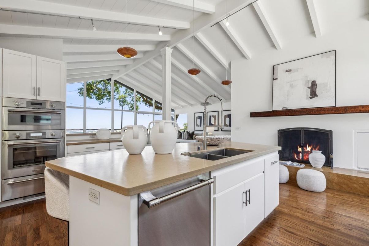 Fireplace, Interior, Kitchen, Stainless Steel Appliances, Wood Texture Flooring