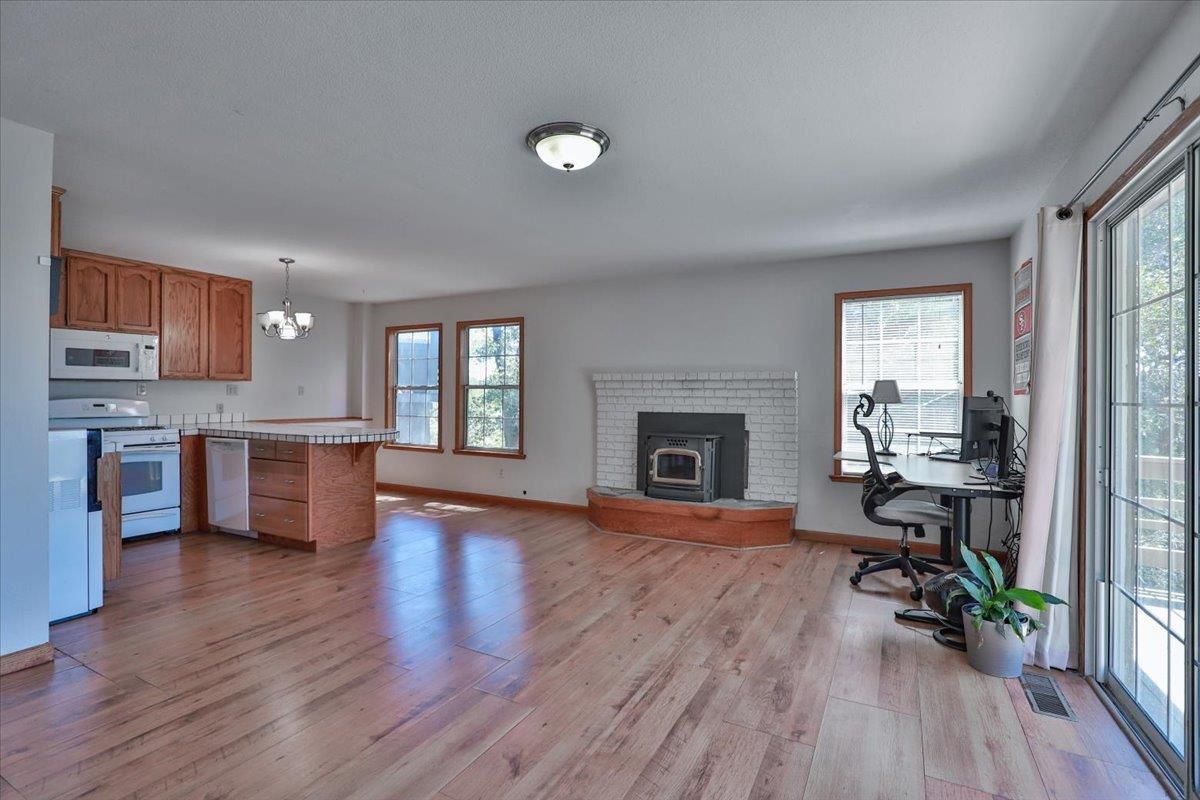 Chandelier, Fireplace, Home Office, Interior, Kitchen, Pendant Lights, Wood Texture Flooring