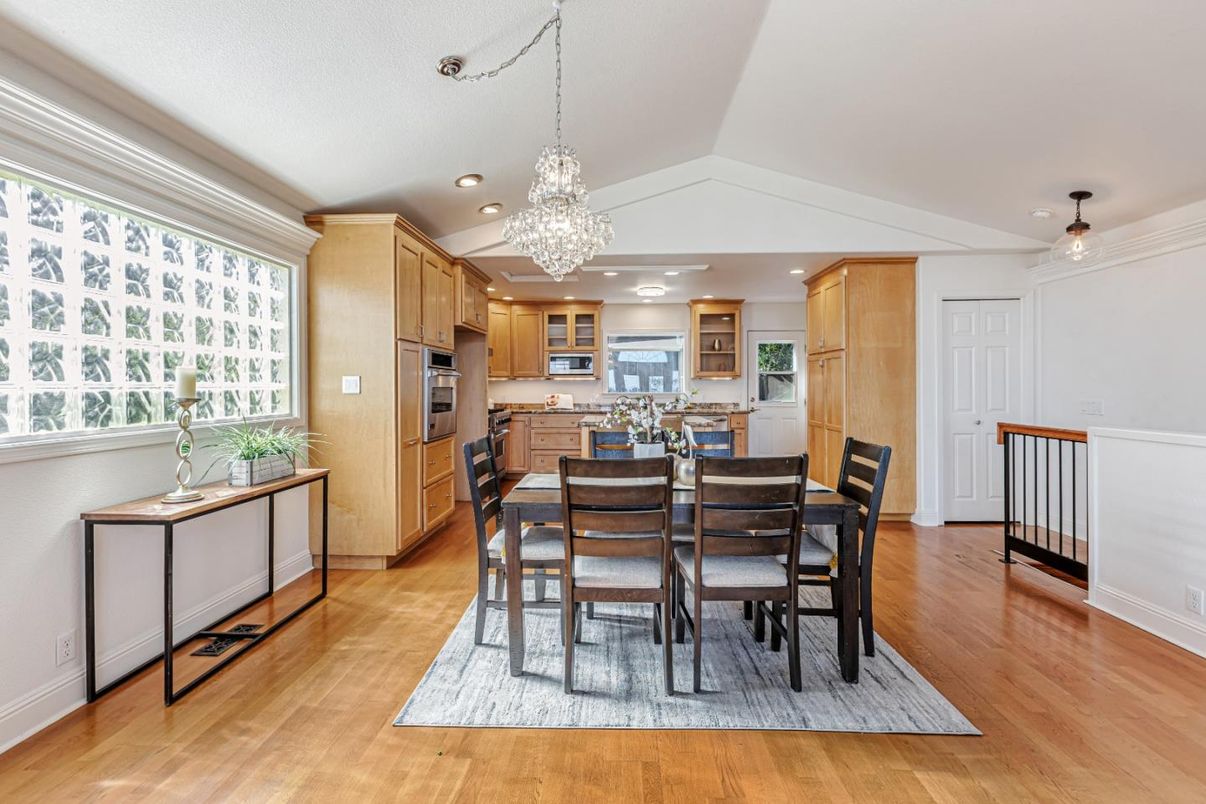 Chandelier, Dining room, Interior, Kitchen, Recessed Lighting, Stainless Steel Appliances, Wood Texture Flooring