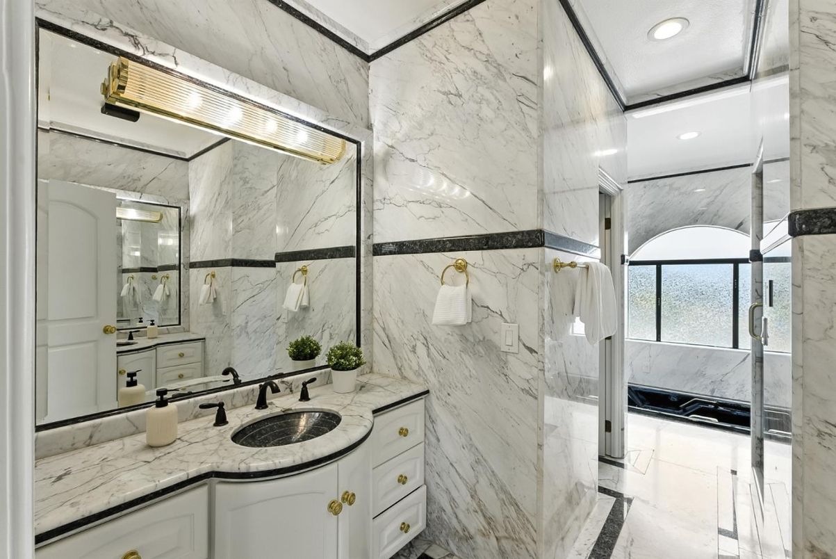 Bathroom, Dual Sink Vanities, Glass Shower, Interior, Marble, Marble Walls, Recessed Lighting