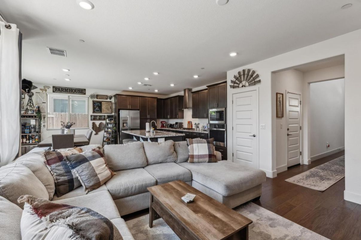 Dining room, Interior, Kitchen, Living room, Recessed Lighting, Stainless Steel Appliances, Wood Texture Flooring