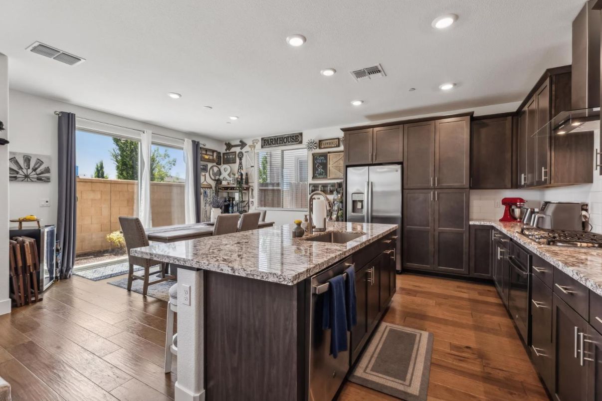 Dining room, Interior, Kitchen, Recessed Lighting, Stainless Steel Appliances, Wood Texture Flooring