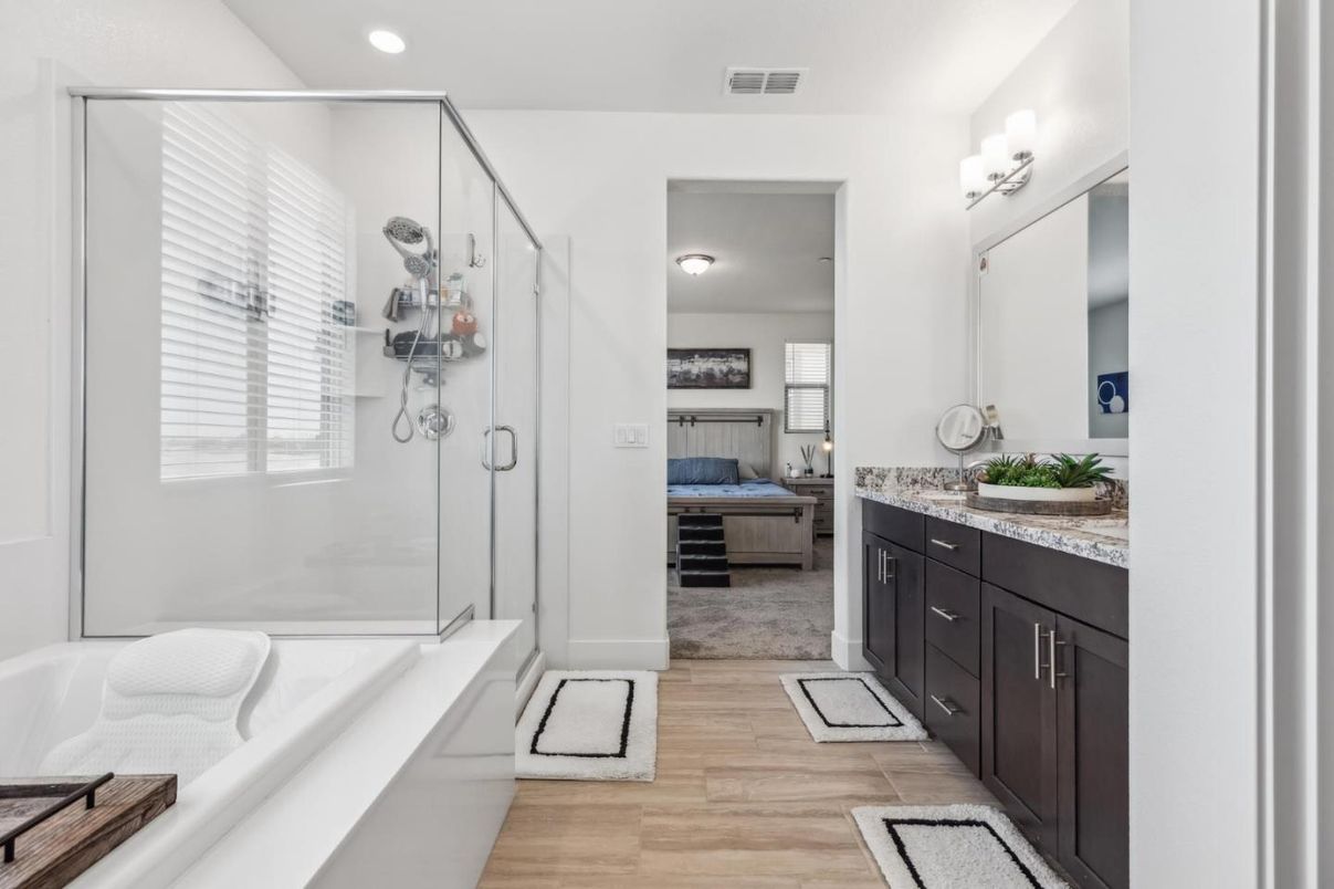 Bathroom, Bedroom, Dual Sink Vanities, Glass Shower, Interior, Recessed Lighting, Wood Texture Flooring