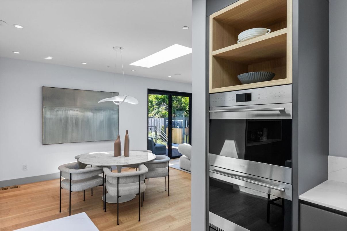 Dining room, Interior, Kitchen, Pendant Lights, Recessed Lighting, Stainless Steel Appliances, Wood Texture Flooring