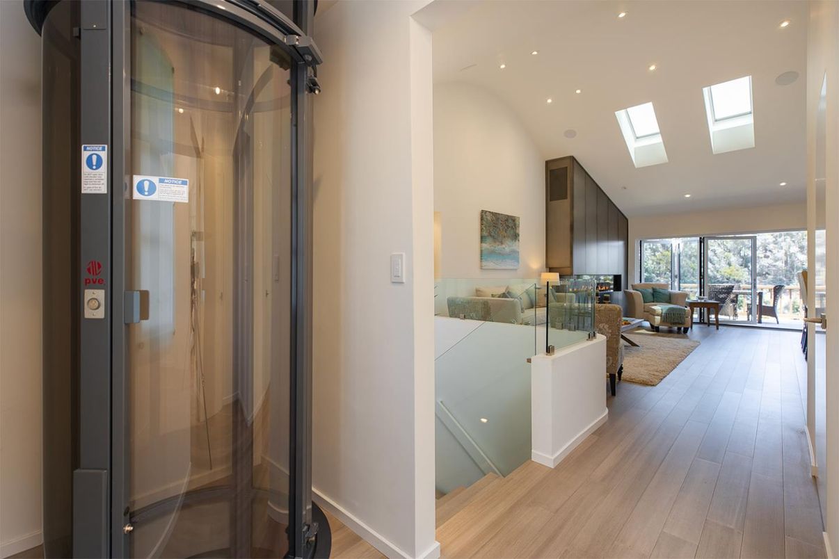 Elevator, Interior, Living room, Recessed Lighting, Wood Texture Flooring