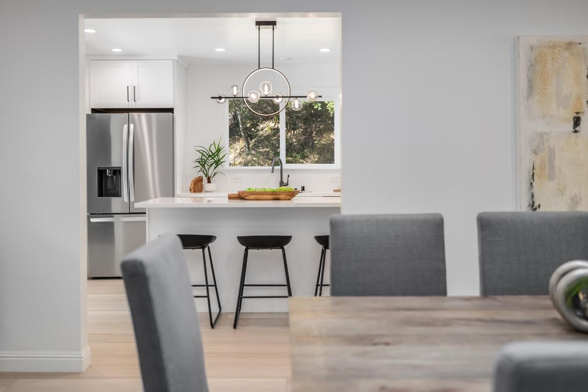Dining room, Interior, Kitchen, Pendant Lights, Recessed Lighting, Stainless Steel Appliances, Wood Texture Flooring