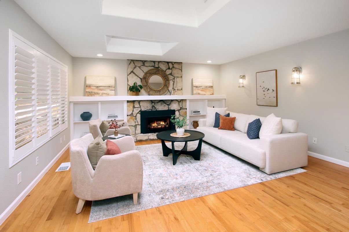 Fireplace, Interior, Living room, Recessed Lighting, Stone Walls, Wood Texture Flooring