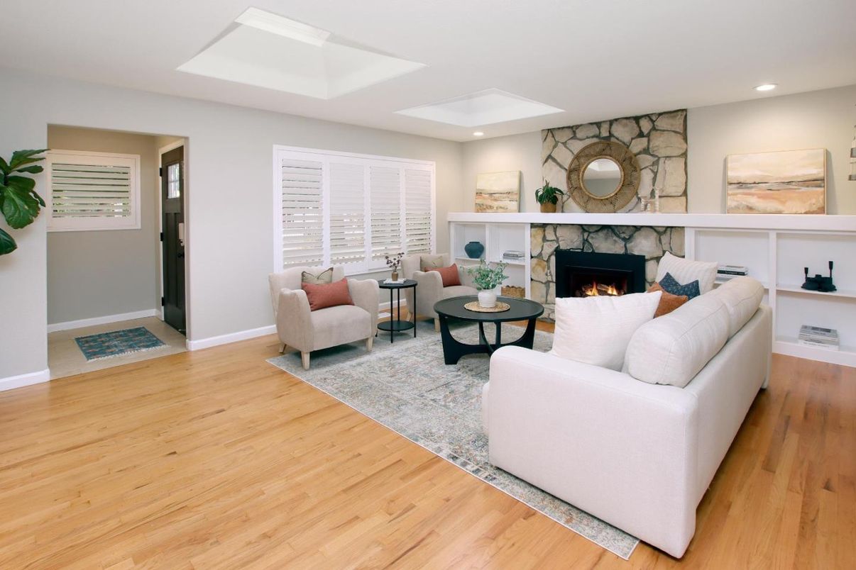Fireplace, Interior, Living room, Recessed Lighting, Stone Walls, Wood Texture Flooring