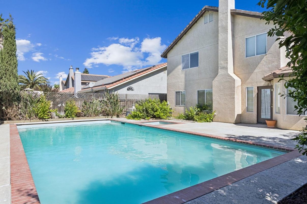 Exterior, Pool, Solar Panels