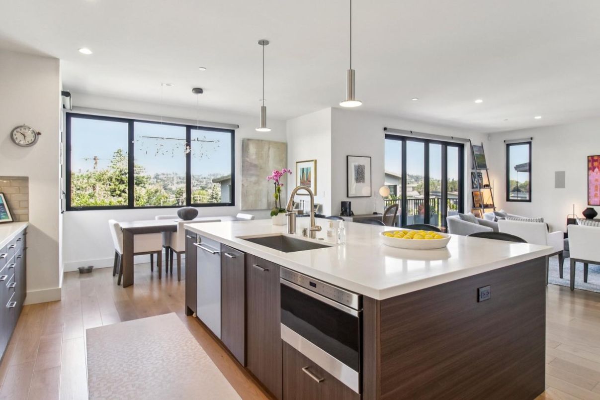 Dining room, Interior, Kitchen, Pendant Lights, Recessed Lighting, Stainless Steel Appliances, Wood Texture Flooring