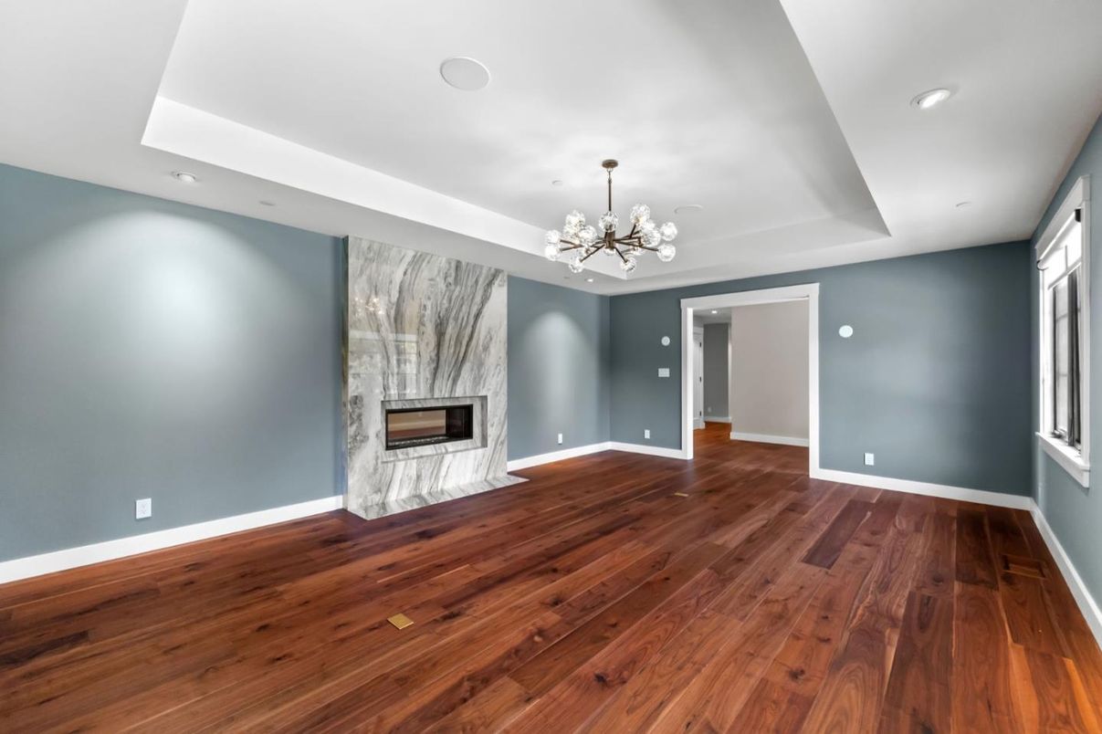 Empty room, Fireplace, Interior, Pendant Lights, Recessed Lighting, Wood Texture Flooring