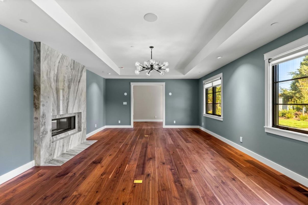 Chandelier, Empty room, Fireplace, Interior, Recessed Lighting, Wood Texture Flooring