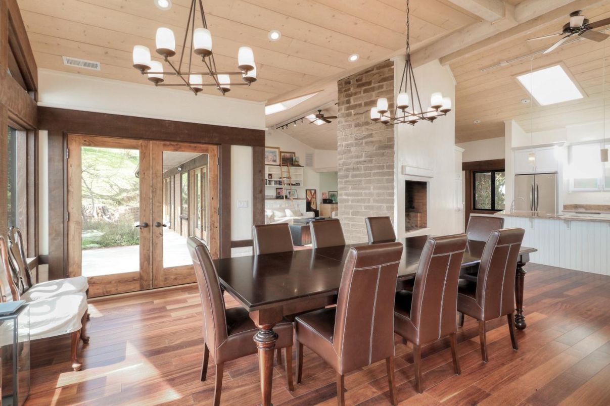 Chandelier, Dining room, Fireplace, Interior, Pendant Lights, Recessed Lighting, Stone Walls, Wooden Beams, Wooden Ceilings, Wood Texture Flooring
