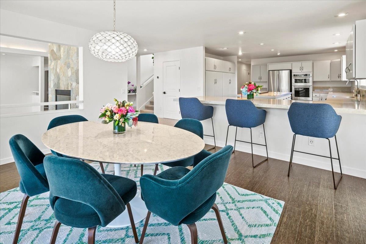 Dining room, Interior, Kitchen, Pendant Lights, Recessed Lighting, Stainless Steel Appliances, Wood Texture Flooring