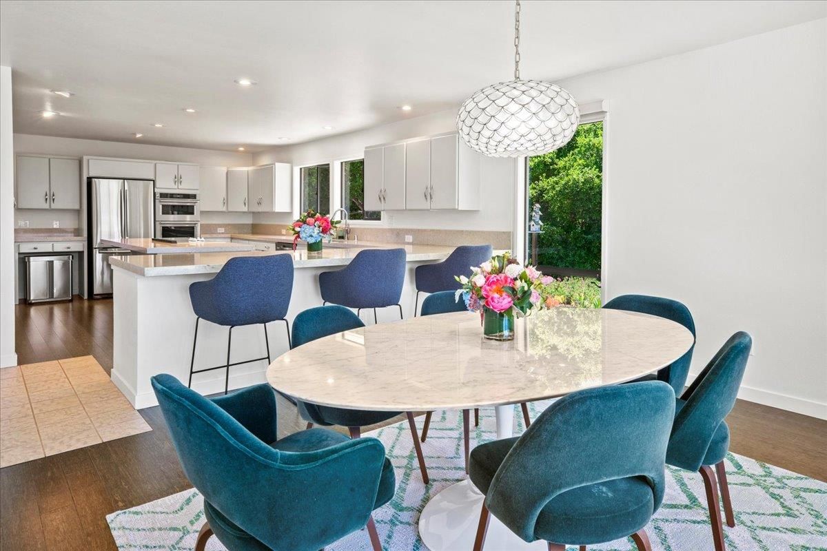Dining room, Interior, Kitchen, Pendant Lights, Recessed Lighting, Stainless Steel Appliances, Wood Texture Flooring