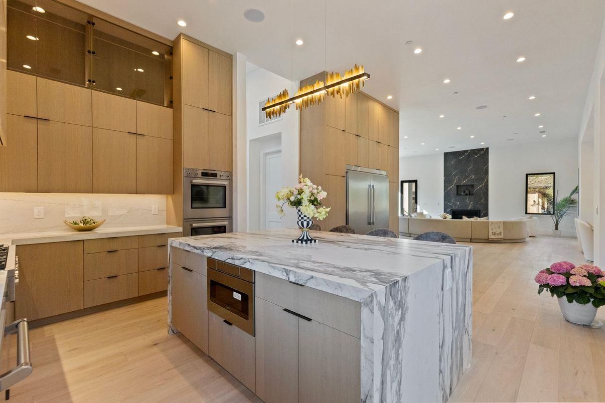 Fireplace, Interior, Kitchen, Pendant Lights, Recessed Lighting, Stainless Steel Appliances, Wood Texture Flooring