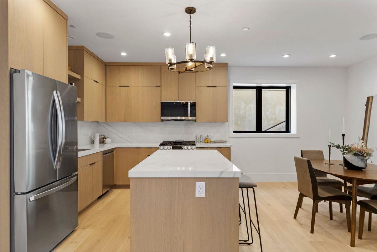 Chandelier, Dining room, Interior, Kitchen, Pendant Lights, Recessed Lighting, Stainless Steel Appliances, Wood Texture Flooring