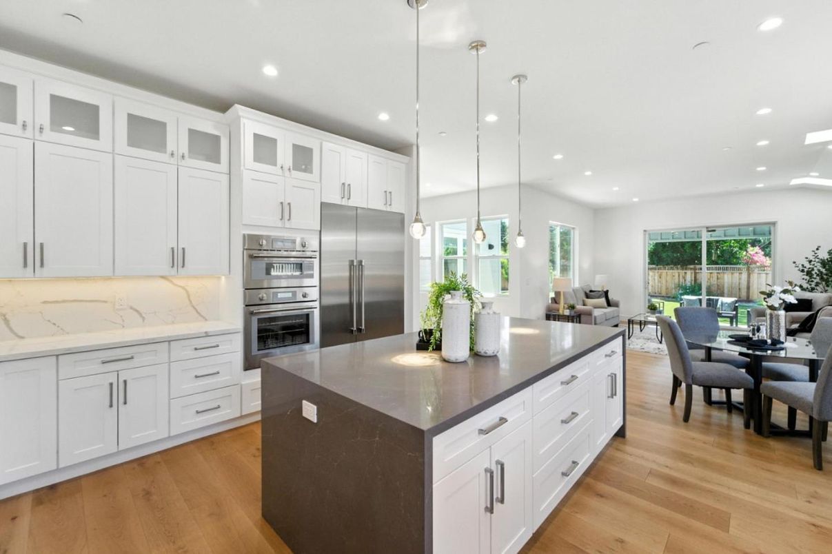 Dining room, Interior, Kitchen, Pendant Lights, Recessed Lighting, Stainless Steel Appliances, Wood Texture Flooring