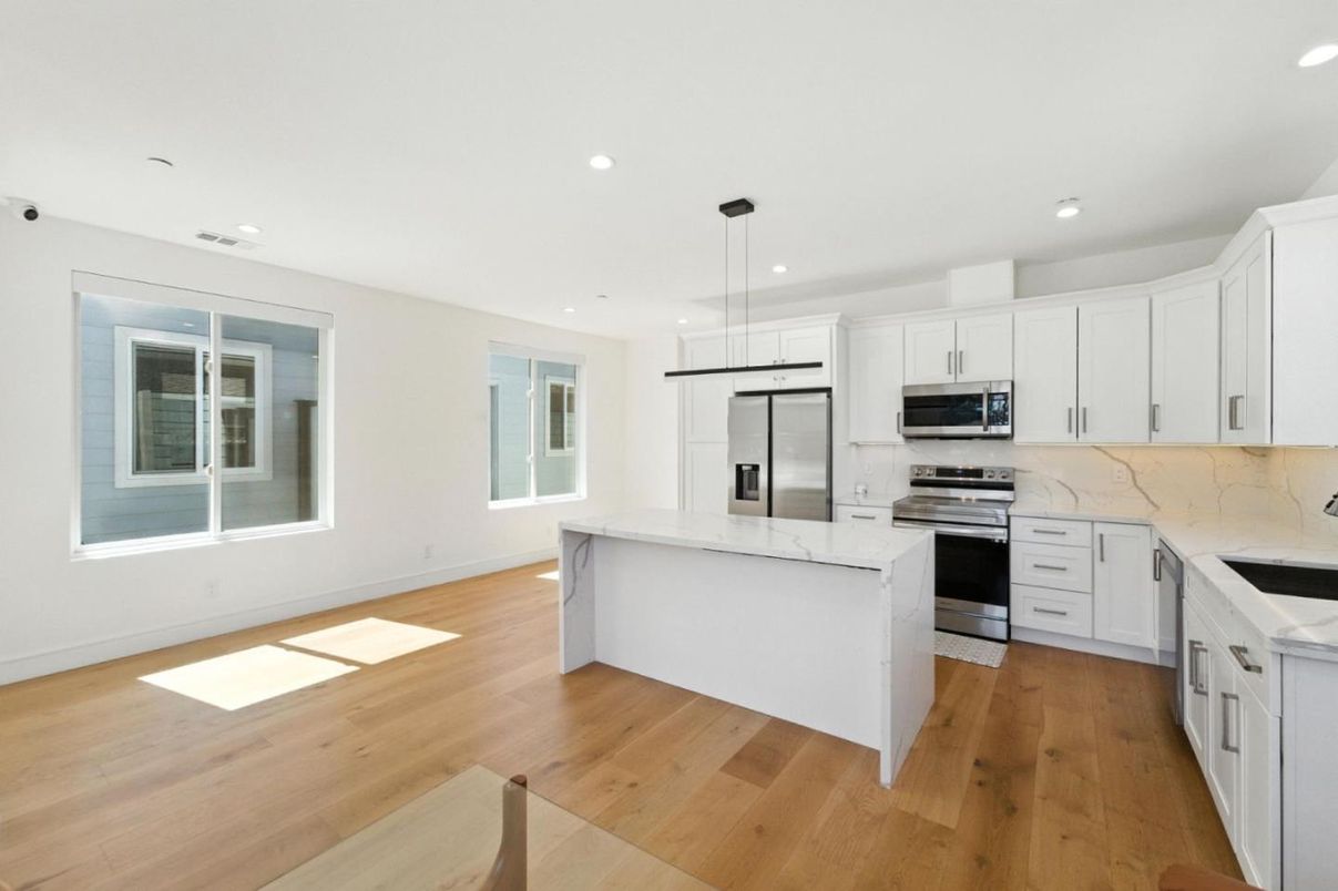 Interior, Kitchen, Pendant Lights, Recessed Lighting, Stainless Steel Appliances, Wood Texture Flooring