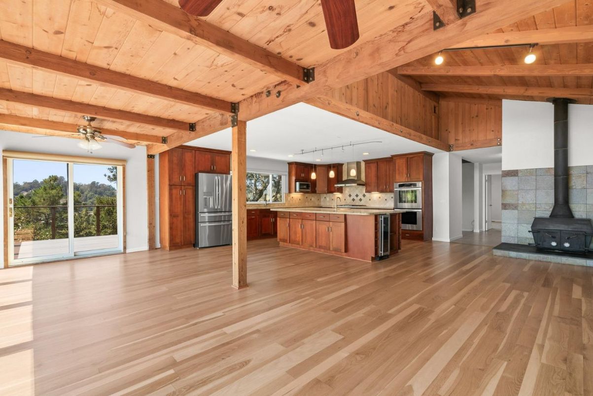 Empty room, Interior, Kitchen, Pendant Lights, Stainless Steel Appliances, Wooden Beams, Wooden Ceilings, Wood Texture Flooring