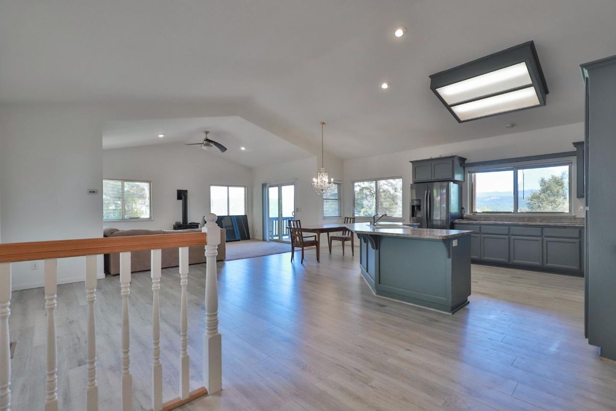 Chandelier, Dining room, Interior, Kitchen, Pendant Lights, Recessed Lighting, Stainless Steel Appliances, Wood Texture Flooring