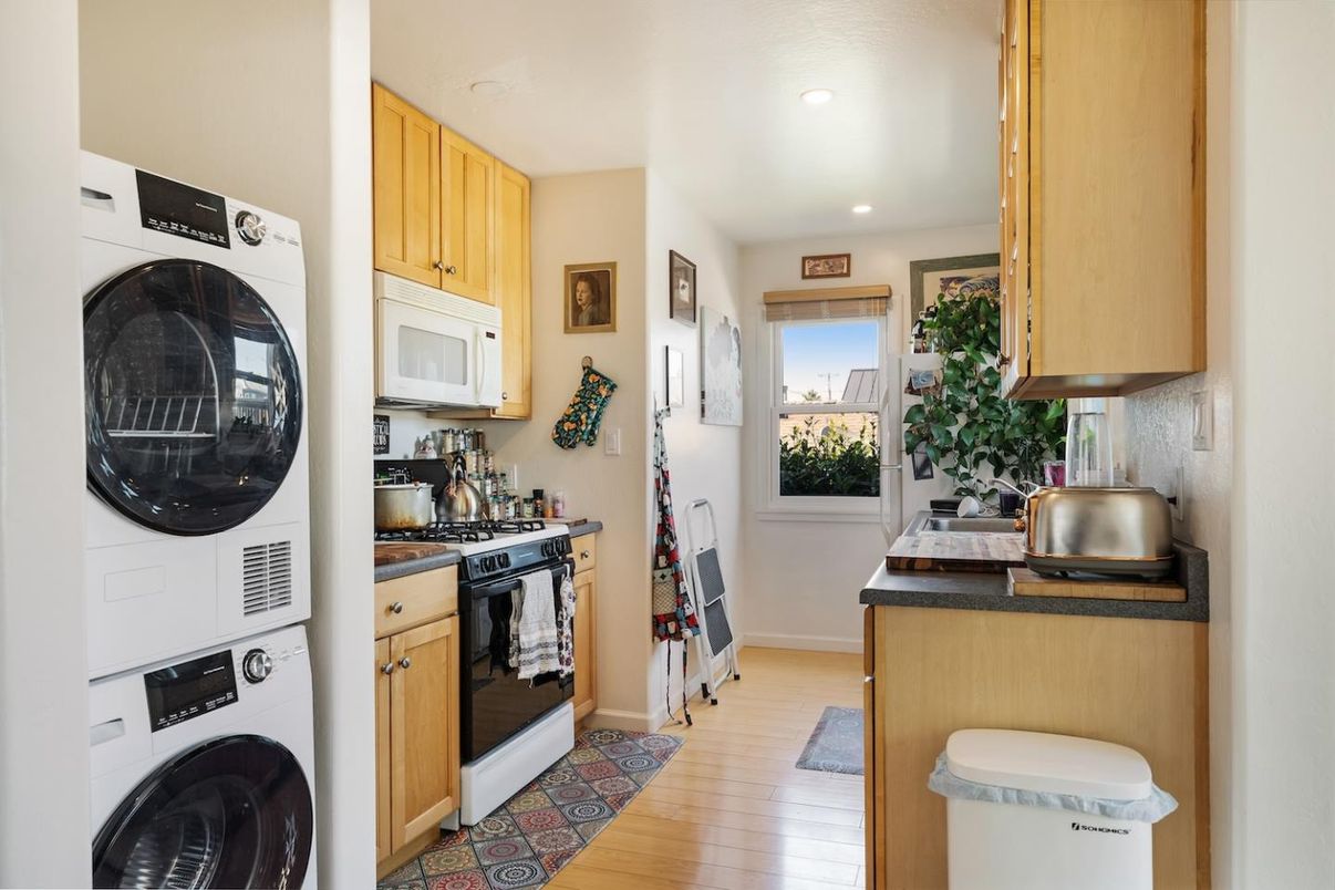 Interior, Kitchen, Recessed Lighting, Washer, Wood Texture Flooring