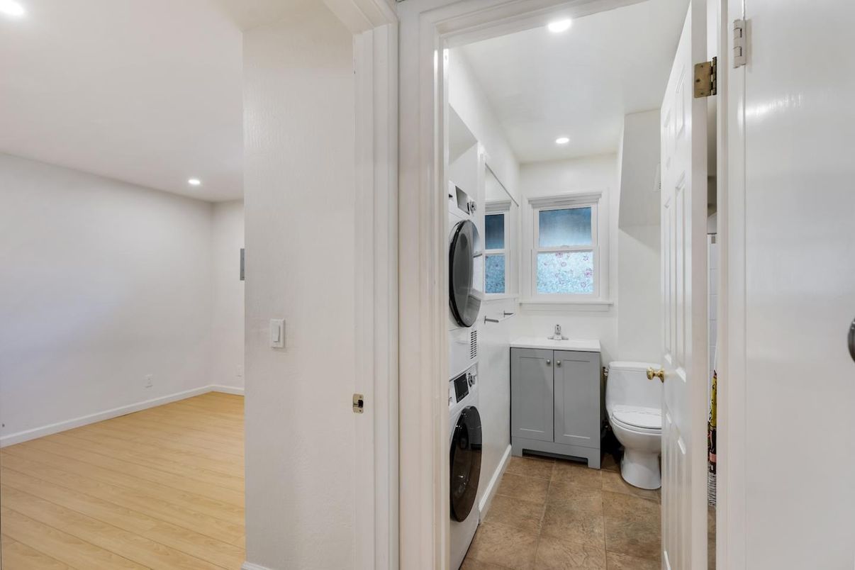 Bathroom, Interior, Recessed Lighting, Washer, Wood Texture Flooring