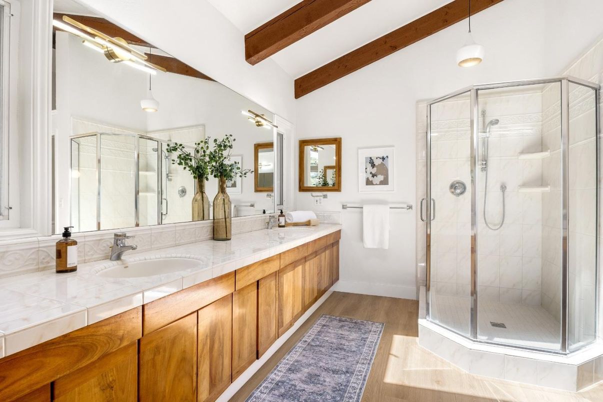 Bathroom, Dual Sink Vanities, Glass Shower, Interior, Pendant Lights, Tile Countertops, Wooden Beams, Wood Texture Flooring
