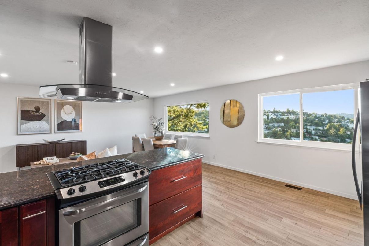 Dining room, Interior, Kitchen, Recessed Lighting, Stainless Steel Appliances, Wood Texture Flooring
