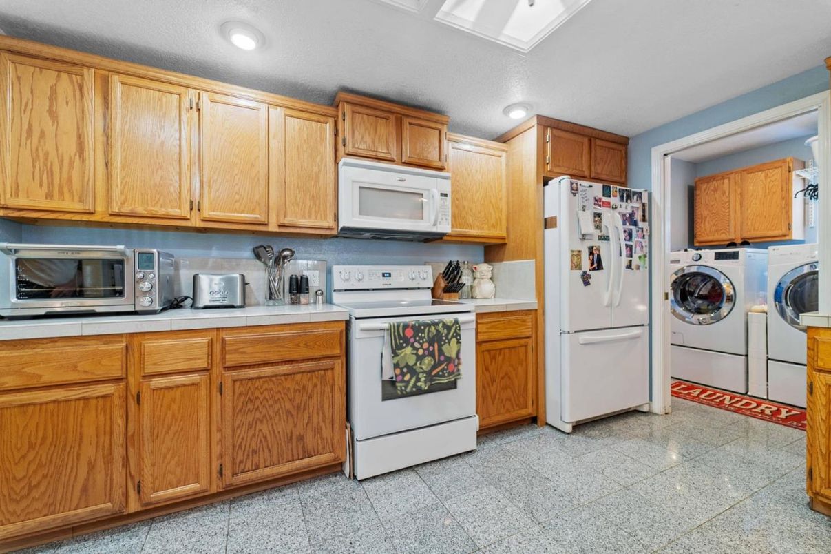 Interior, Kitchen, Recessed Lighting, Tile Countertops, Washer