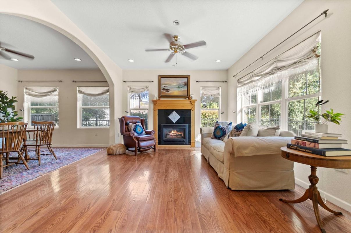 Dining room, Fireplace, Interior, Living room, Recessed Lighting, Wood Texture Flooring
