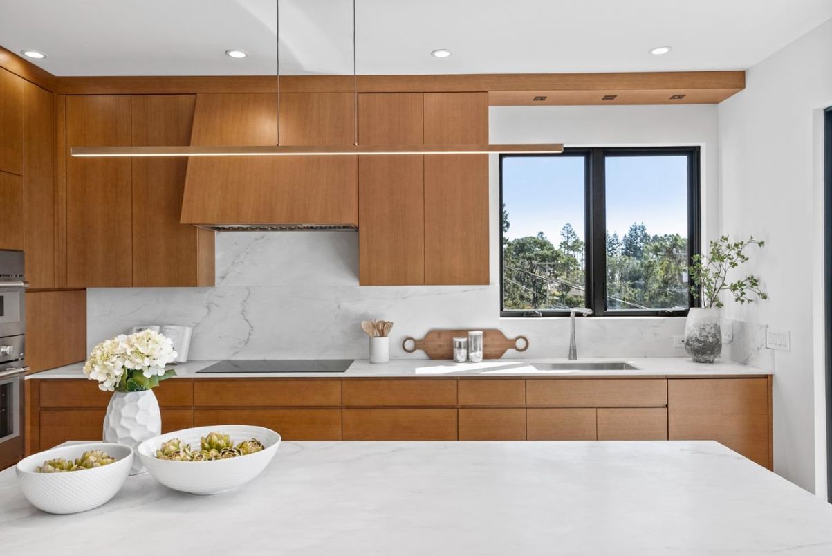 Interior, Kitchen, Marble Walls, Recessed Lighting, Stainless Steel Appliances
