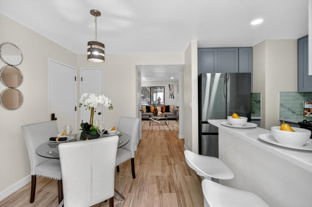 Dining room, Interior, Kitchen, Pendant Lights, Recessed Lighting, Stainless Steel Appliances, Wood Texture Flooring