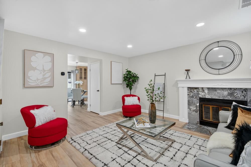 Dining room, Fireplace, Interior, Living room, Recessed Lighting, Wood Texture Flooring