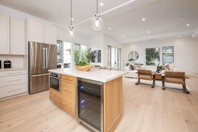 Dining room, Interior, Kitchen, Living room, Pendant Lights, Recessed Lighting, Stainless Steel Appliances, Wood Texture Flooring